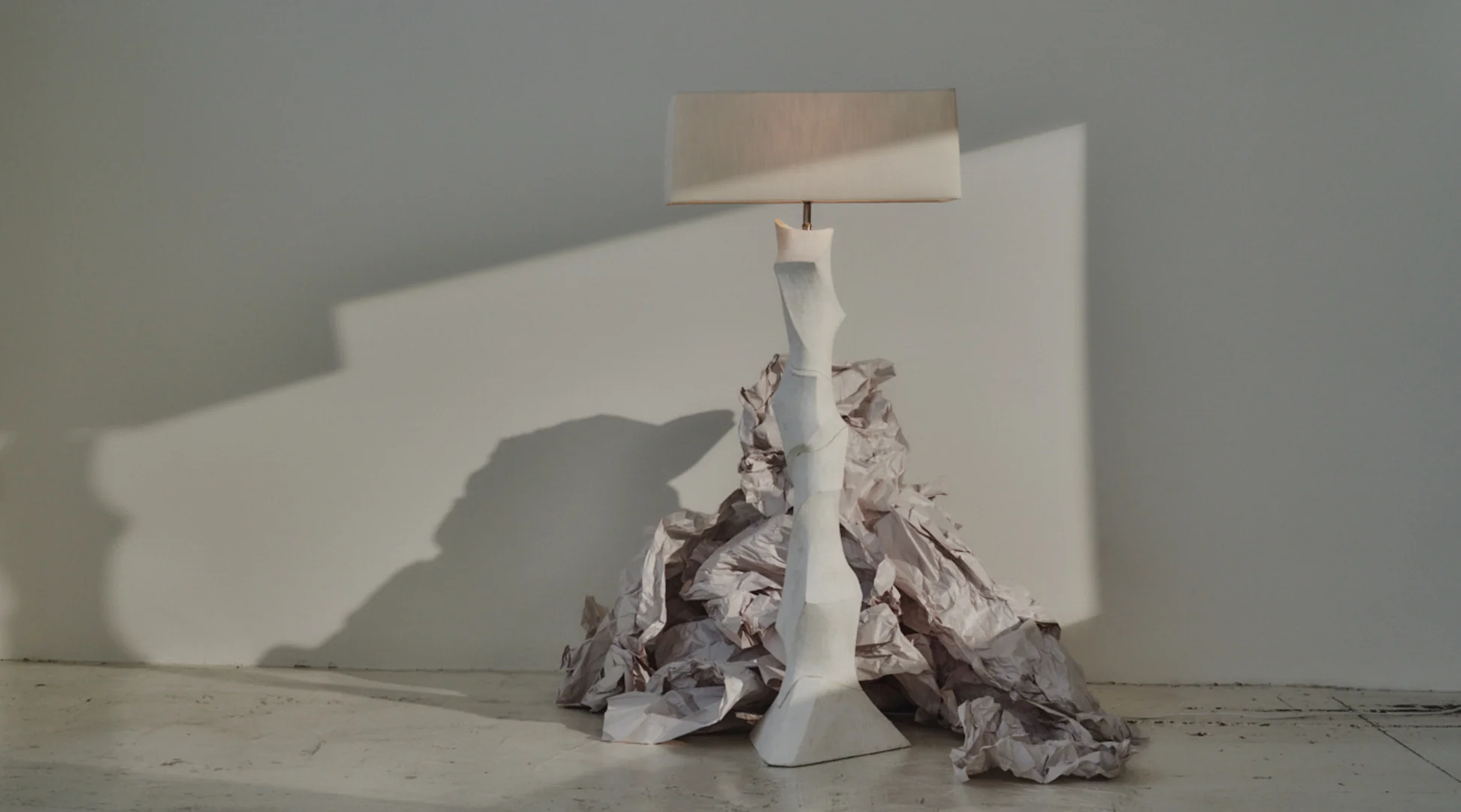 Sculptural floor lamp in sunlight